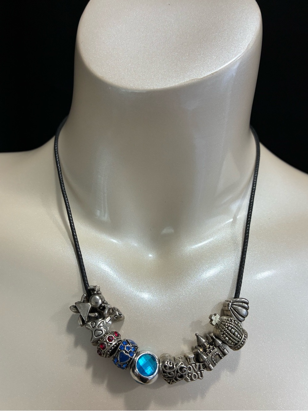 Black Cord Necklace with Silver Travel Themed Chunky Charms Blue and Red Accents